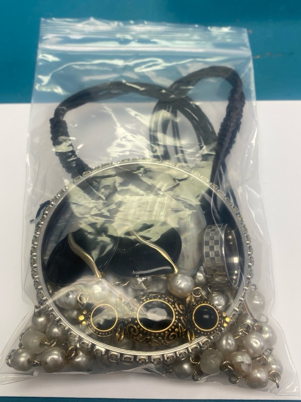 Mixed costume jewelry bag.